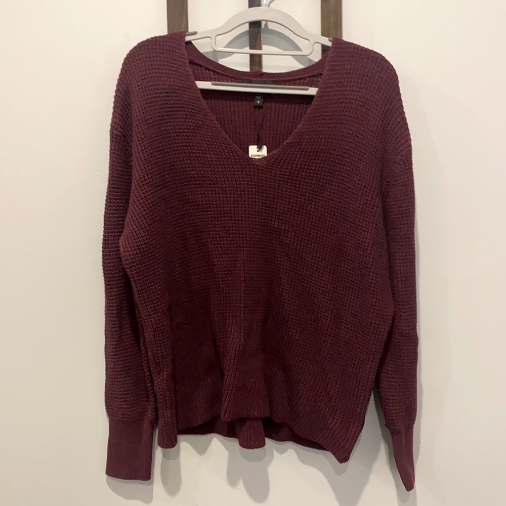 Never worn, tags on sweater from express.